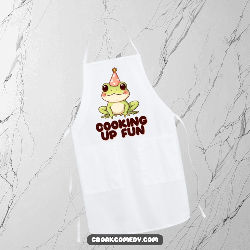 Funny Apron showcasing a happy frog wearing a tiny party hat, designed for kitchen fun and protection with a festive and humorous appeal.