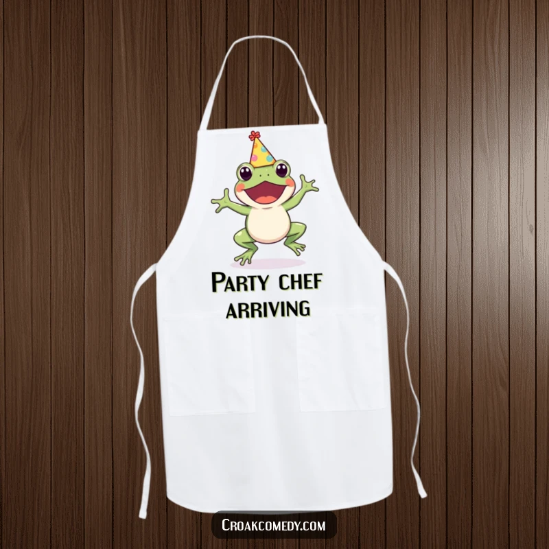 Funny Frog Apron: A cute frog wearing a party hat, energetically hopping, ready to cook, adding humor to the kitchen, a funny gift.