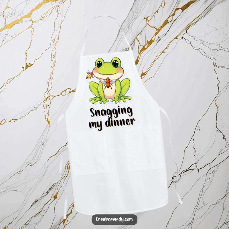 Funny Apron showcasing a smiling frog balancing a fly on its tongue, designed for kitchen fun and protection with a humorous, quirky appeal.