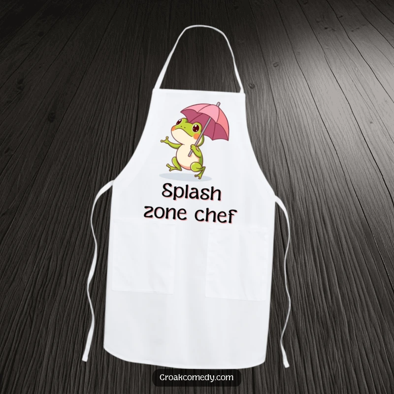 Funny frog with a small umbrella, ready to cook, featured on a durable apron for cheerful kitchen moments.