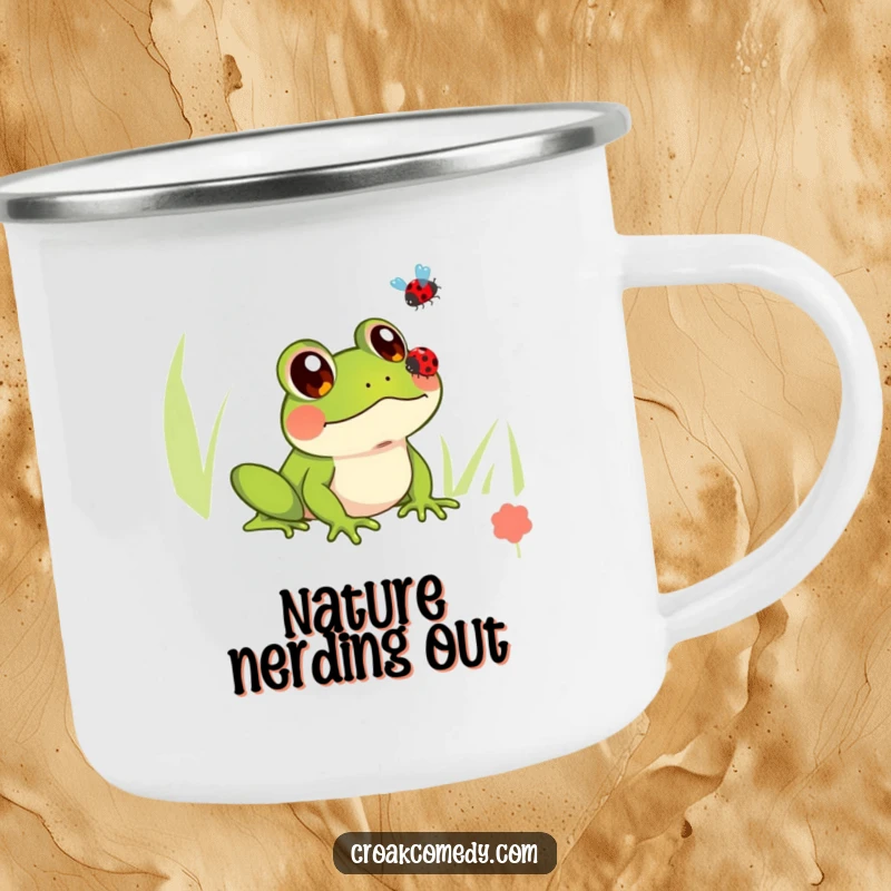 Funny enamel camping mug with a frog showing innocent eyes watching a ladybug fly, perfect for outdoor beverages.