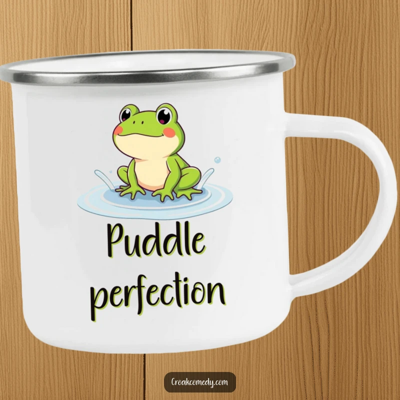 Funny frog camping mug featuring a frog splashing in a puddle. A humorous and durable gift for outdoor lovers.