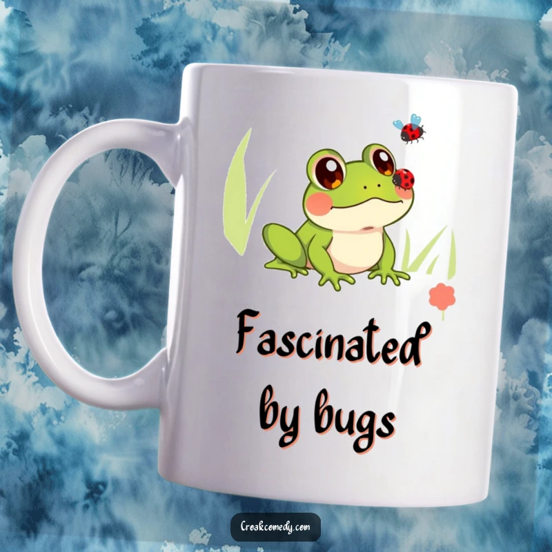 Funny mug showing a frog with large, innocent eyes intently watching a ladybug fly past, conveying wonder and peace.