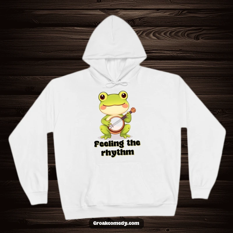 Funny frog hoodie featuring a cheerful frog enthusiastically playing a tiny banjo, designed for musical humor and warmth.