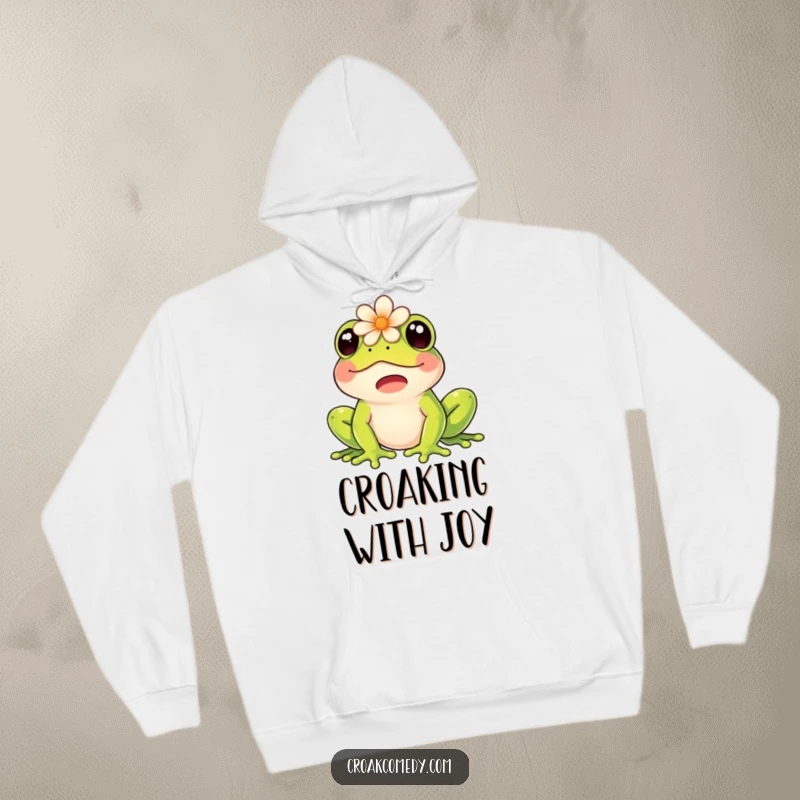 Funny hoodie with a happy frog wearing a flower on its head, joyfully croaking, perfect for cozy wear.