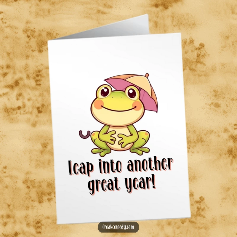 Funny Free Printable Birthday Card: Cheerful frog with a wide smile, holding a tiny umbrella, ready to celebrate any occasion.