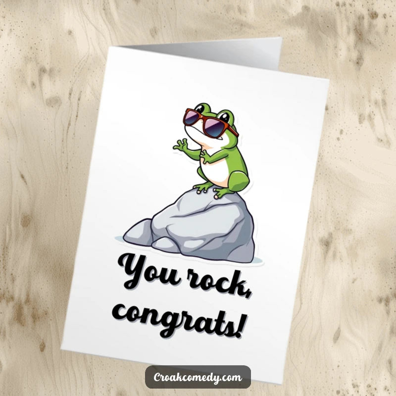Funny Free Printable Congrats Card: A frog sporting stylish sunglasses, chilling on a rock, looking super cool.