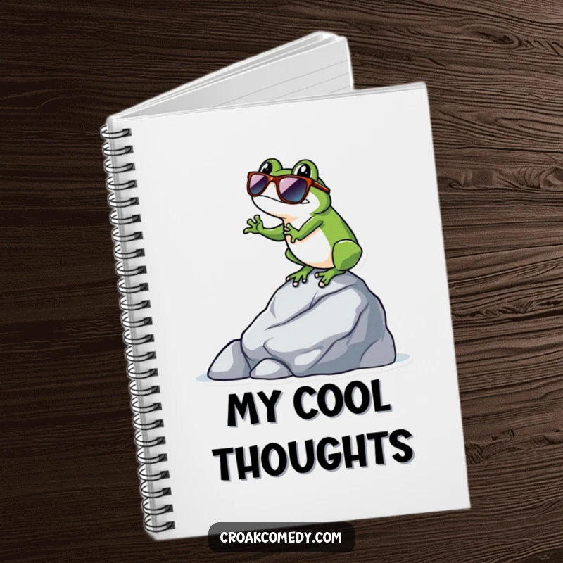 Funny frog wearing sunglasses, balancing on a rock, making this notebook cover both humorous and cool.