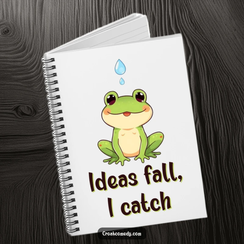 Funny notebook cover with a cheerful frog catching a falling raindrop, designed to inspire creativity and bring joy to writing.
