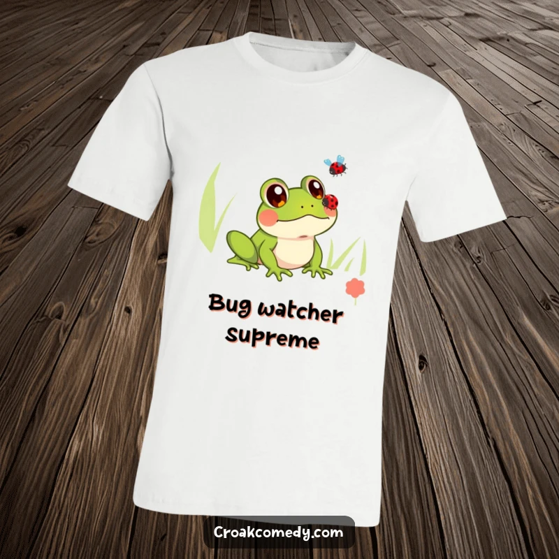 Funny t-shirt featuring a frog with big, innocent eyes observing a ladybug flying nearby, capturing a moment of pure fascination.