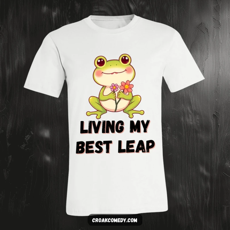 Funny Frog T-Shirt featuring a cheerful frog holding a flower, legs spread wide in a joyful pose, perfect for gifting.
