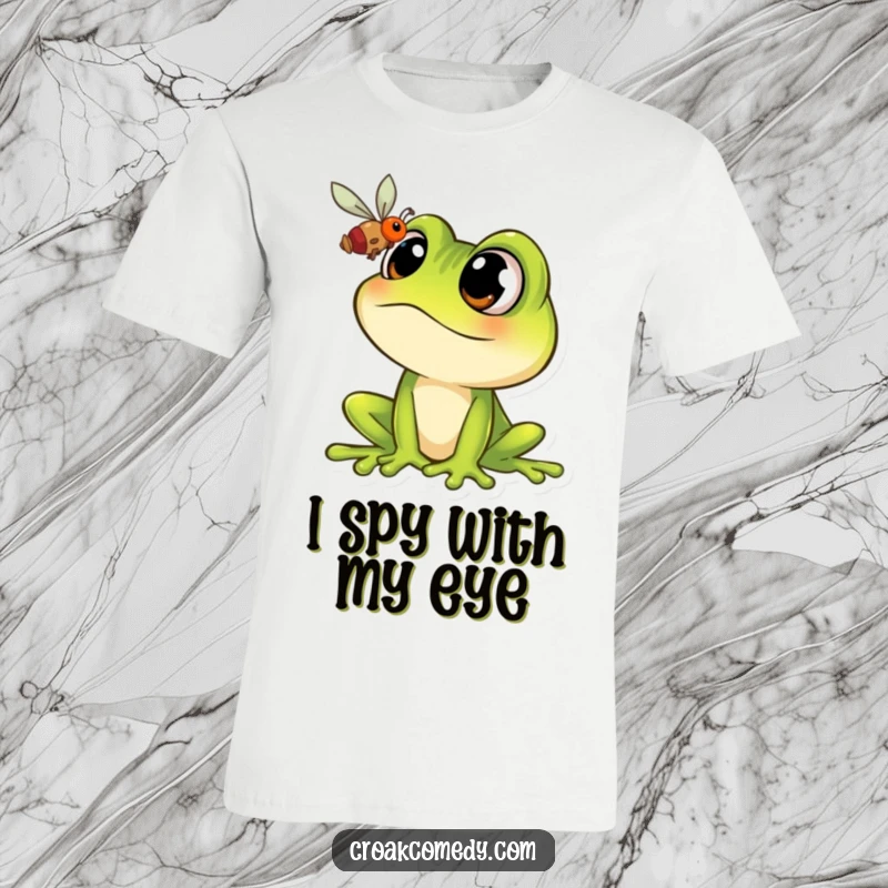 Funny Frog T-Shirt: Cartoon frog character with huge eyes locked onto a fly, expressing comical anticipation.