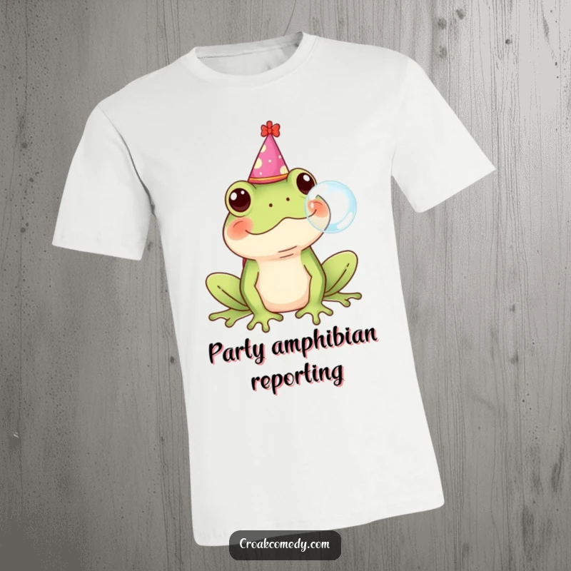 Funny Frog T-Shirt wearing a party hat, blowing a bubble with a cheerful expression.