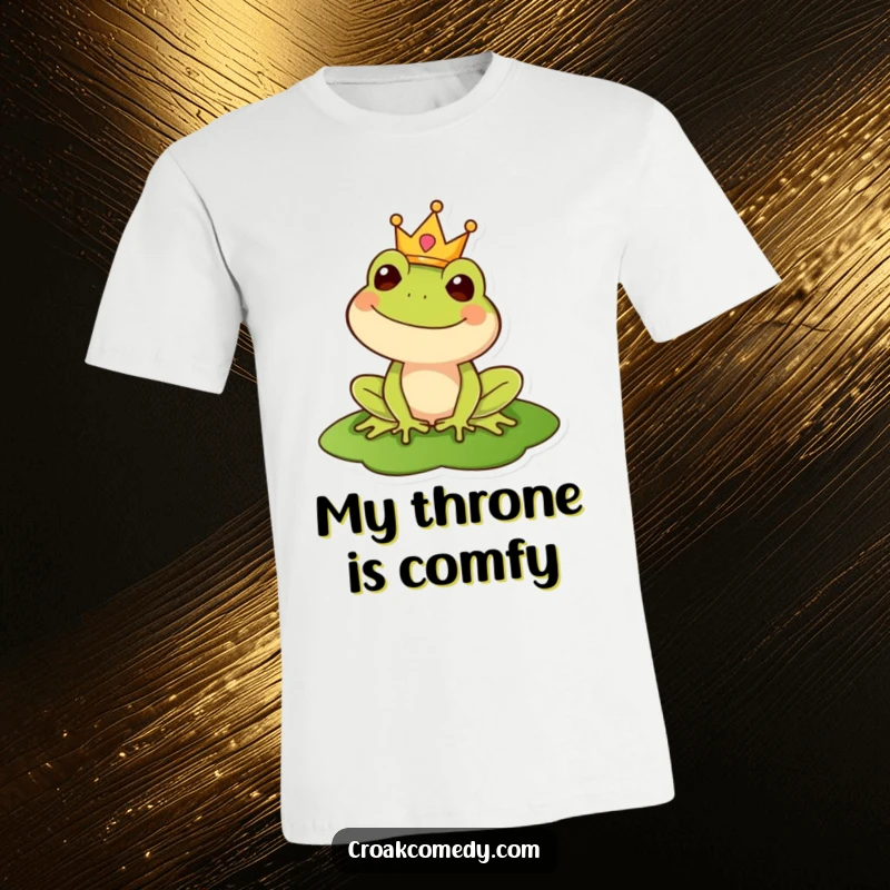 Funny t-shirt featuring a happy frog wearing a small crown, sitting on a lily pad, exuding playful majesty.