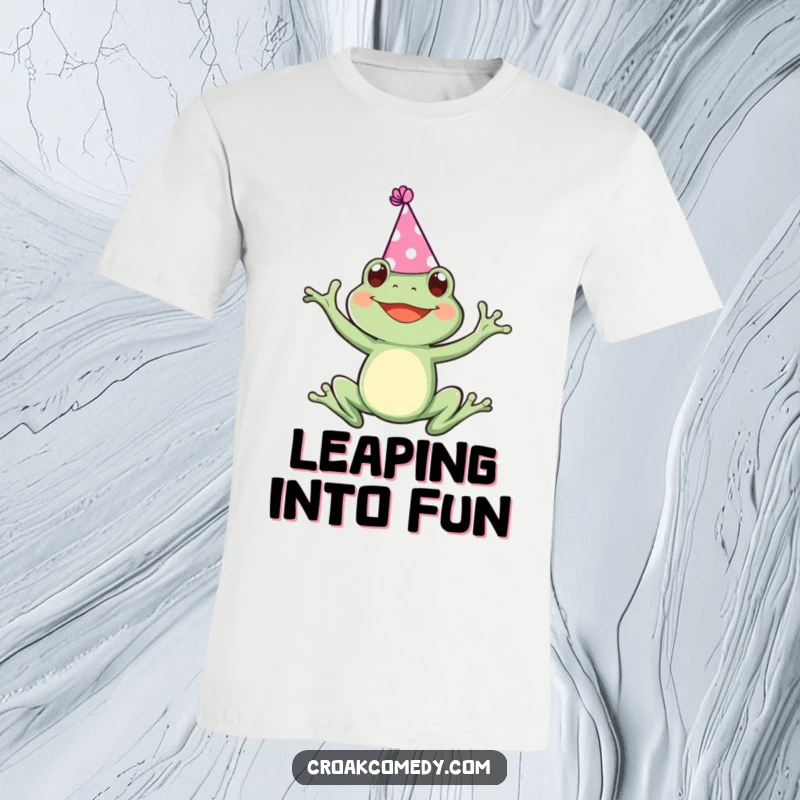 Funny t-shirt depicting a frog wearing a diminutive party hat, leaping joyfully through the air with pure exuberance.