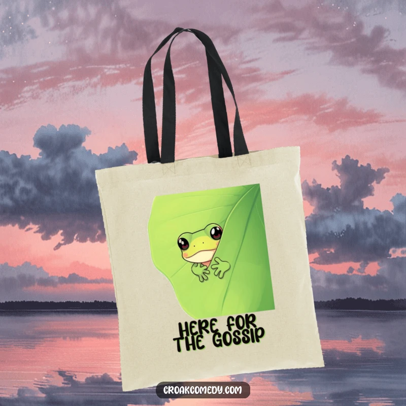 Funny frog peeking from behind a large leaf, adding a humorous and charming touch to this versatile tote bag.